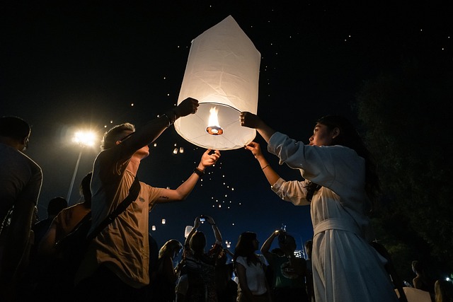Night view of Jinju Namgang lanterns festival with reflections on water